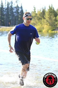 Chad running in ice cold water